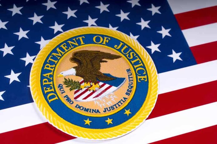1054857701 featured image Department of Justice emblem on the American flag.