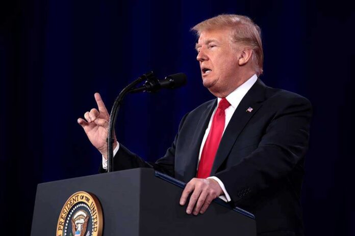 1852444018 featured image Man speaking at a podium.