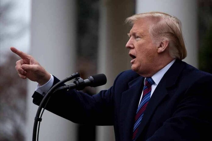 1276349383 featured image Man gesturing while speaking at a podium outside