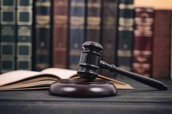 1686878860 featured image Gavel and open book in library setting