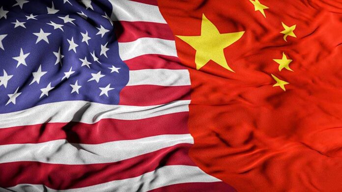 1831548649 featured image American and Chinese flags woven together fabric texture