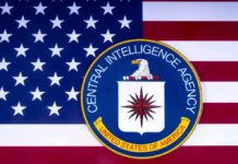 CIA logo over American flag background.