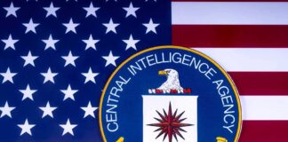 CIA logo over American flag background.