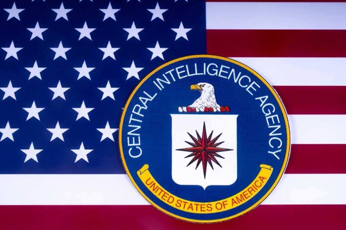 1051373186 featured image CIA logo over American flag background.