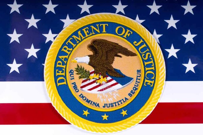 1054857686 featured image Department of Justice seal on American flag background