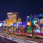 Las Vegas Strip at night with bright neon lights.