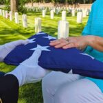 Flag folded and handed over at gravesite ceremony