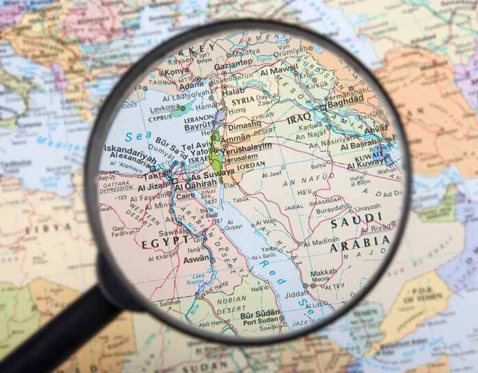 162063665 featured image Magnifying glass focused on the Middle East map.