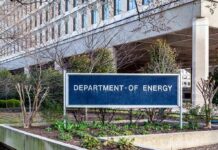 Department of Energy sign outside a government building.