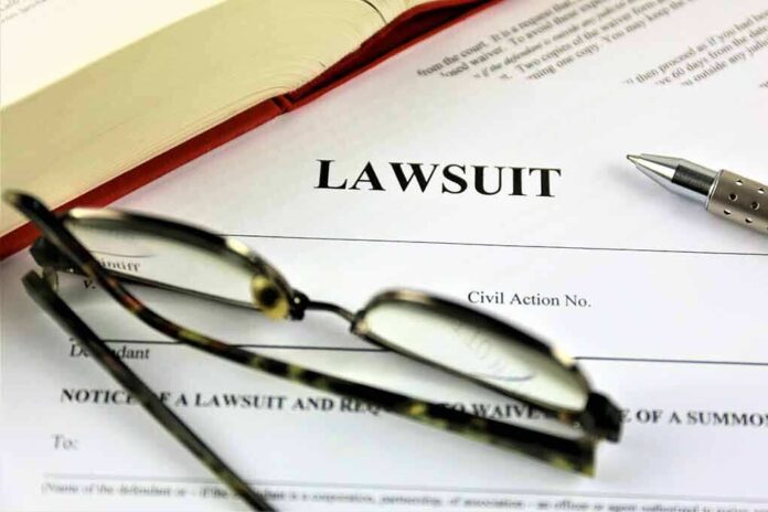 775833220 featured image Lawsuit document with pen glasses and open book