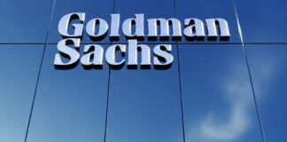 Goldman Sachs sign on glass building facade