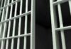 Close-up of prison cell bars