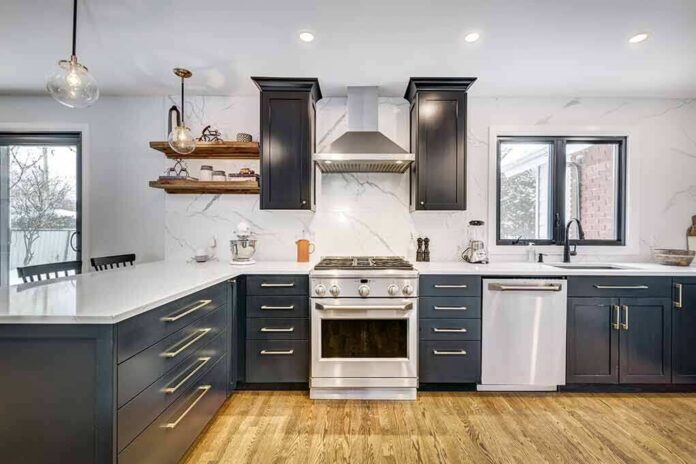 Modern kitchen with black cabinets and marble countertops