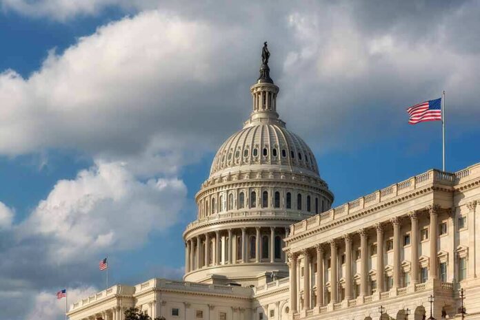 1896126403 featured image US Capitol Building with American flags and clouds