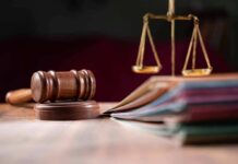 Judges gavel, scales of justice, and legal documents