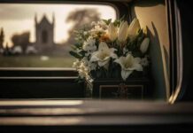 White flowers in a car with blurred background