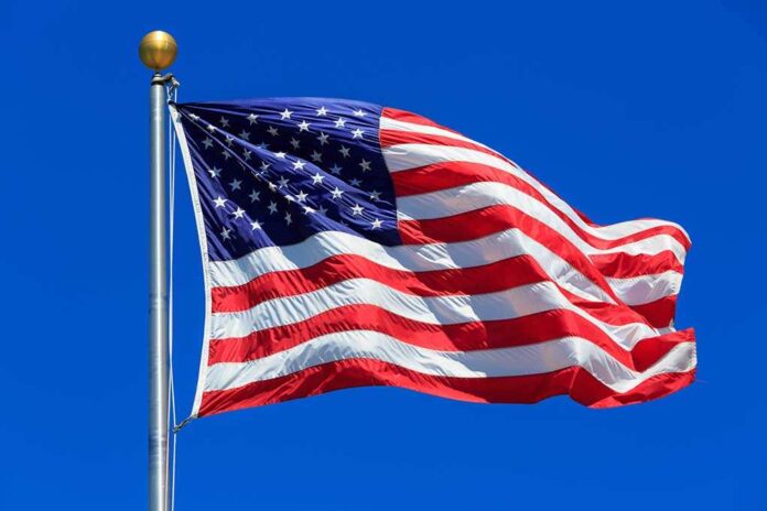 442392457 featured image United States flag waving against blue sky