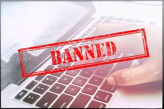 616838987 featured image Red Banned stamp over a laptop keyboard