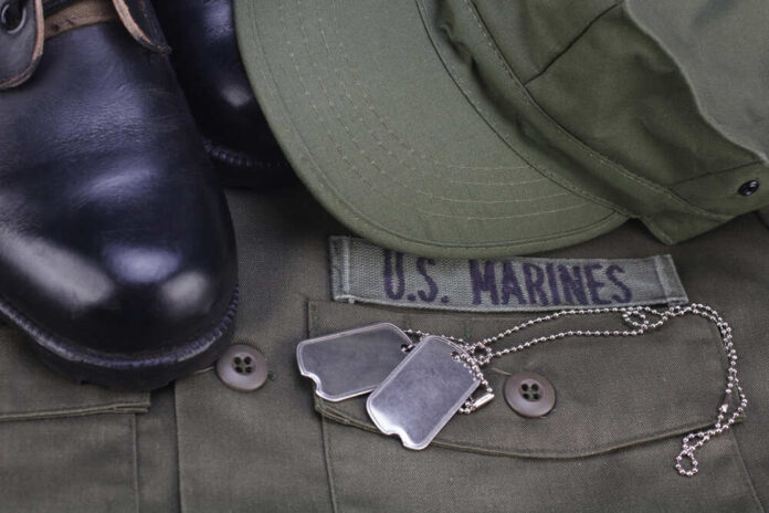 shutterstock_1630141729.jpg featured image US Marines uniform with boots and dog tags