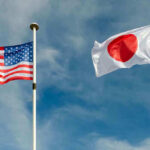 Osprey Emergency: Military Cooperation at Risk? USA and Japan flags flying on flagpoles