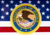 Department of Justice seal on American flag background