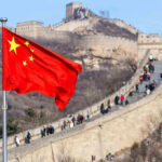 Chinese flag by the Great Wall of China