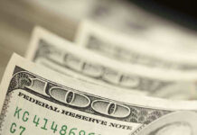 Close up of hundred-dollar bills