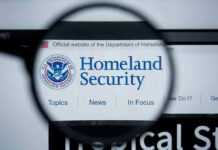 Magnifying glass showing Homeland Security website