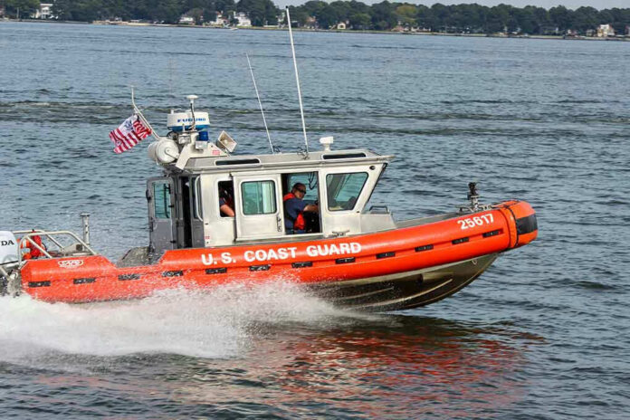 1750211480 Coast Guard boat speeding on the water