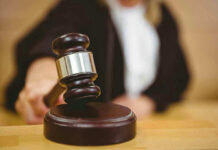 Judge striking gavel in a courtroom
