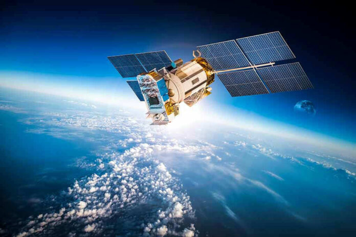 363654452 Satellite orbiting Earth with moon in background