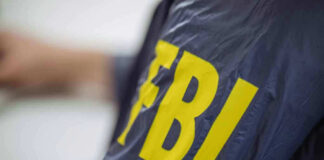FBI jacket with yellow lettering