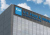 FDA building with blue logo and sky background.