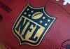 Close up of an NFL football with the logo prominently displayed