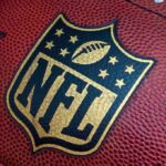 Close up of an NFL football with the logo prominently displayed
