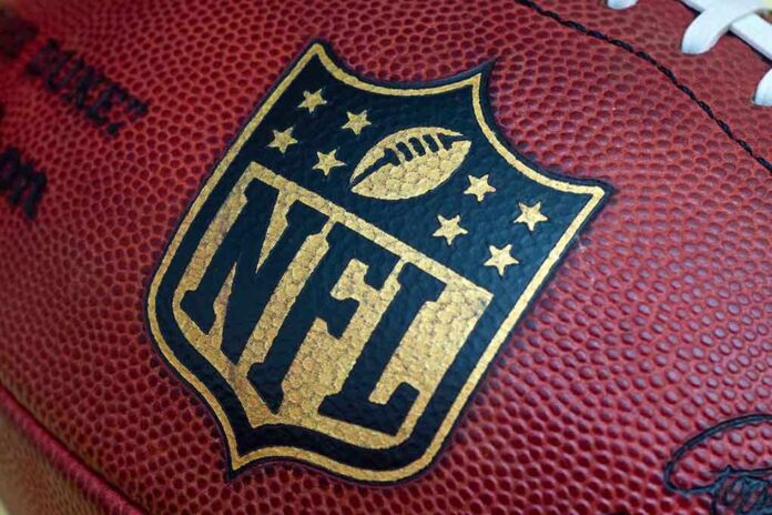 Close up of an NFL football with the logo prominently displayed