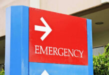 Emergency sign with arrow pointing right.