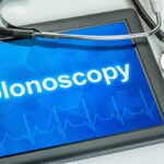 Tablet displaying the word Colonoscopy with a stethoscope beside it