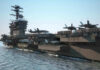 Legendary USS Nimitz HUMILIATES China One Last Time Aircraft carrier deck with jet planes.