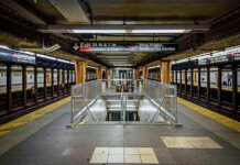 Penn Station Baby DUMP — Mother Finally ARRESTED Subway station platform with directional signs overhead.