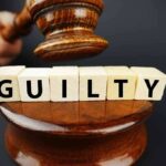 Insanity Defense REJECTED — Legal Shocker A gavel striking down next to wooden blocks spelling 'GUILTY'
