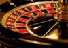 NBA Coaches Caught in Mafia Betting Scandal Close-up of a roulette wheel with a spinning ball