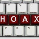 Ex-Trooper’s BIZARRE Hoax — Public Trust SHATTERED Close-up of a computer keyboard with the word HOAX spelled out in red keys