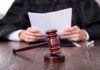 BRAZEN Legal Move Could Help Criminals A judge holding documents with a gavel in the foreground