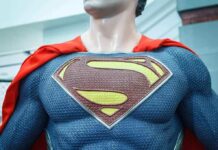 As SNAP Fails — A HERO Steps UP! Close-up of a Superman statue wearing a blue costume and red cape