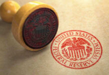 MASSIVE Fed Shift Nobody Saw Coming Federal Reserve stamp and wooden stamp on paper