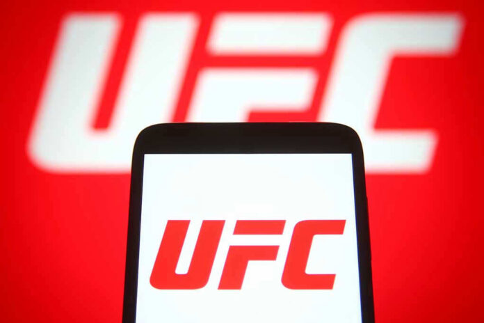 2049779753 UFC logo on phone screen and background.
