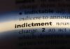 Congresswoman INDICTED For Theft SCANDAL Close-up of a dictionary page showing the definition of 'indictment'