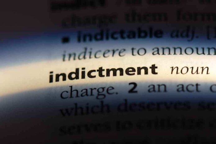 shutterstock_1155452680.jpg Close-up of a dictionary page showing the definition of 'indictment'