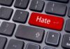 NYC’s Jewish Families at RISK — Hate Crimes SOAR Close-up of a keyboard with a red key labeled Hate